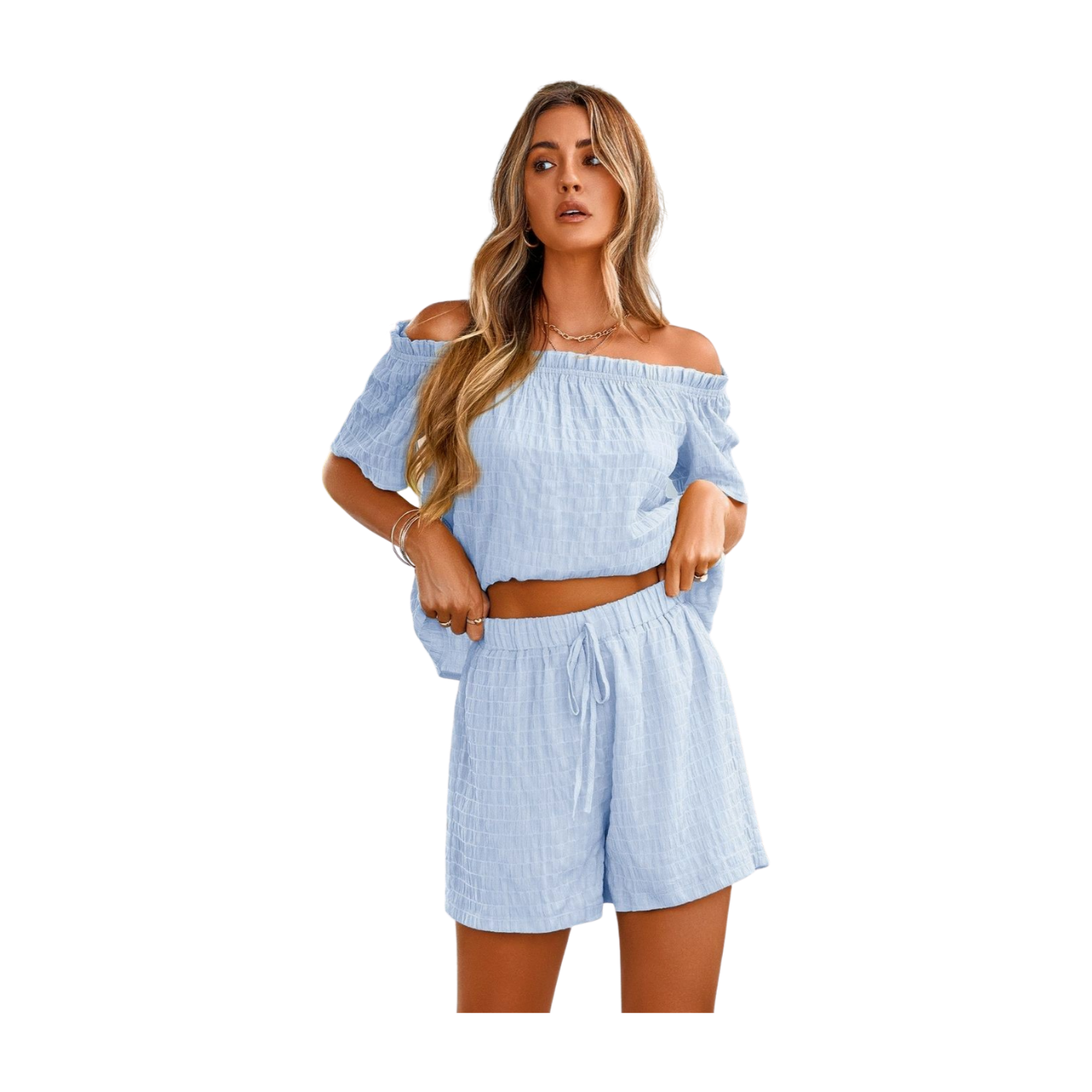 Woman wearing off-shoulder short sleeve top and tied shorts set—trendy and versatile for everyday wear.