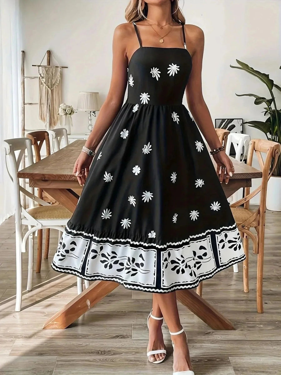 Woman in tiered floral midi dress from minbolu