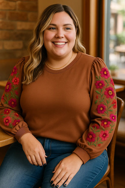 Accurate lifestyle photo of brown floral puff sleeve plus size blouse