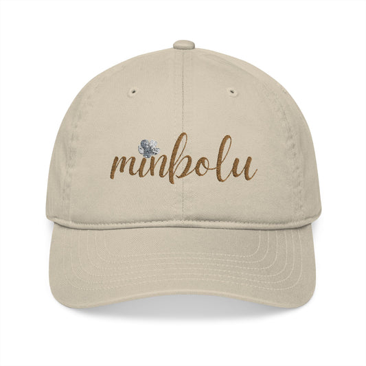 Beige cap with 'minbolu' text on a white background